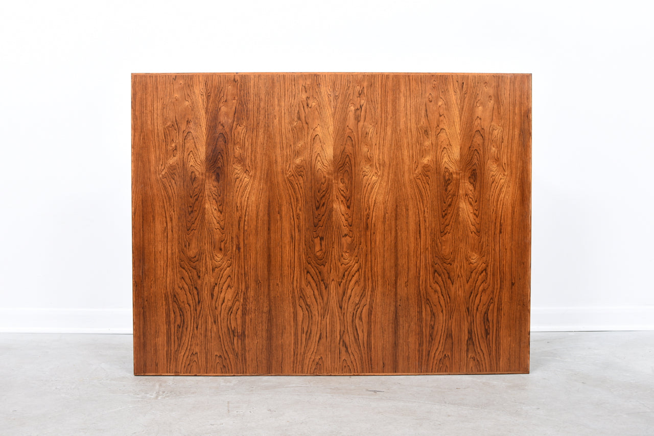 Extending rosewood dining table by Erik Buch