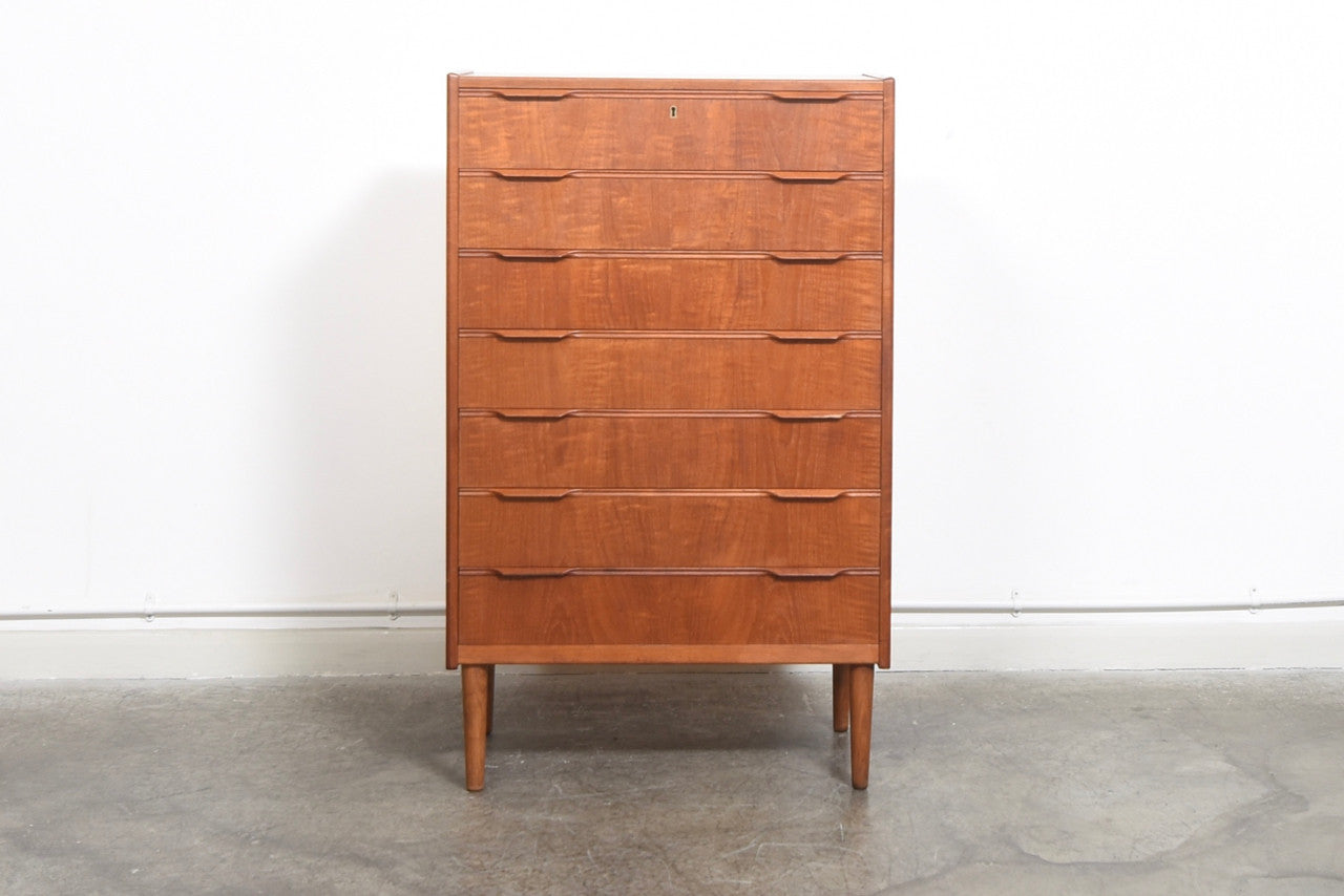 Teak chest of seven drawers