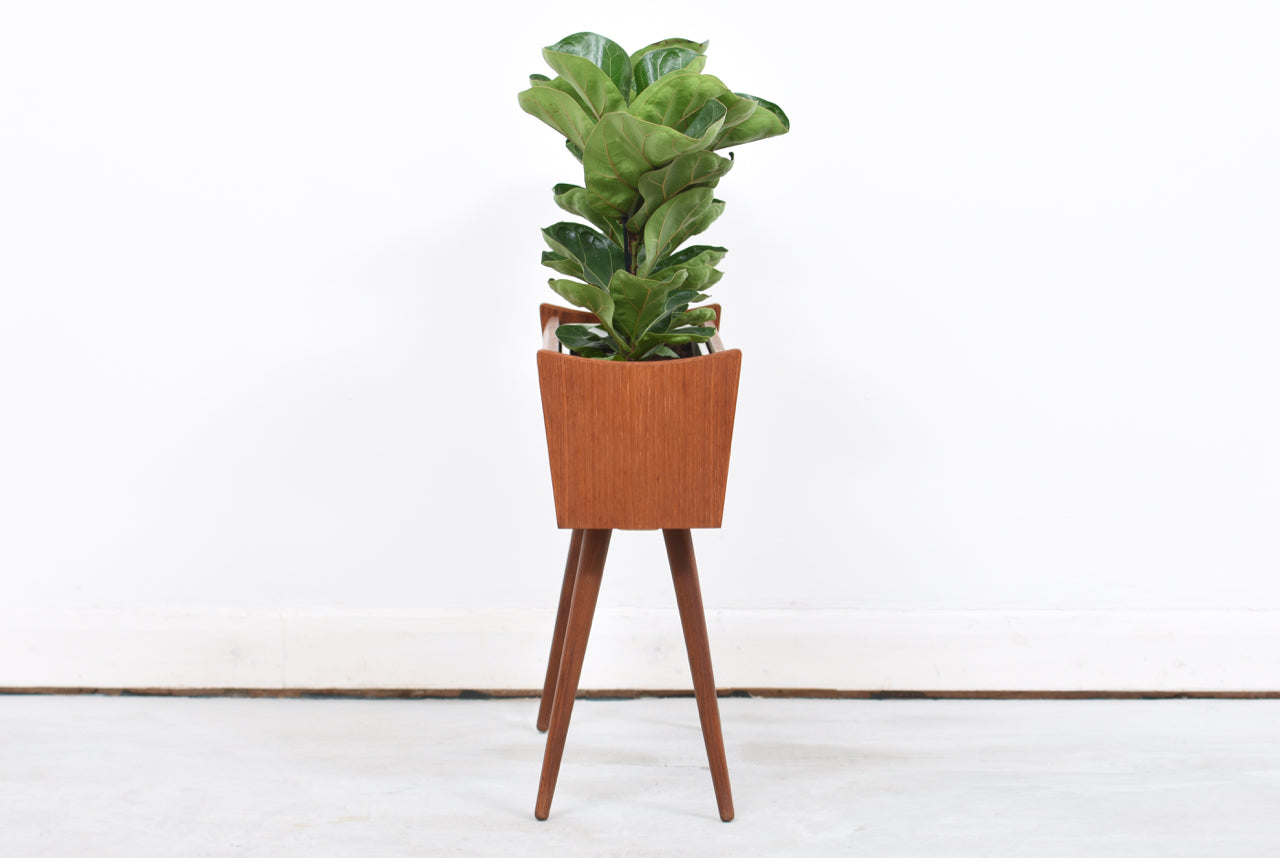 Teak planter on splayed legs