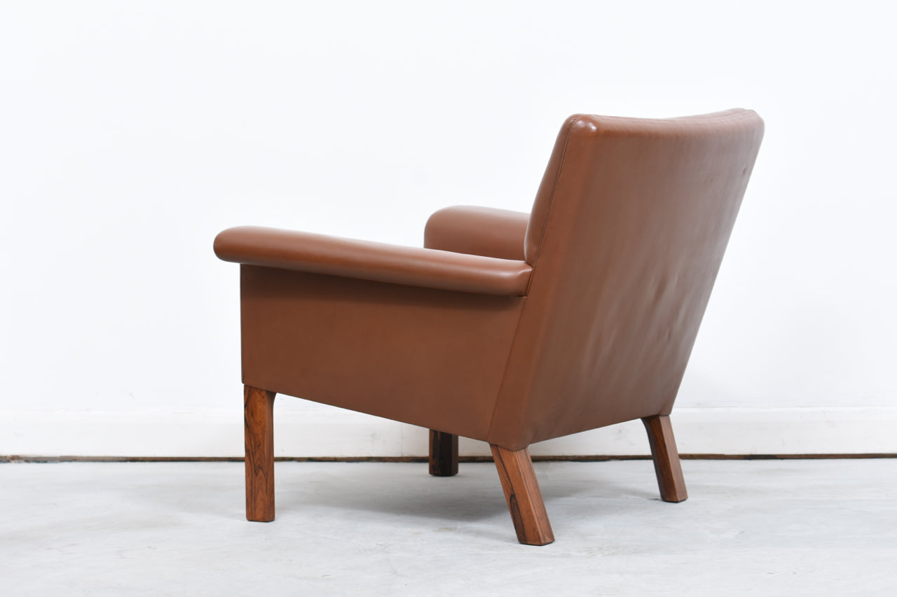 Two available: Leather lounge chair by G. Thams