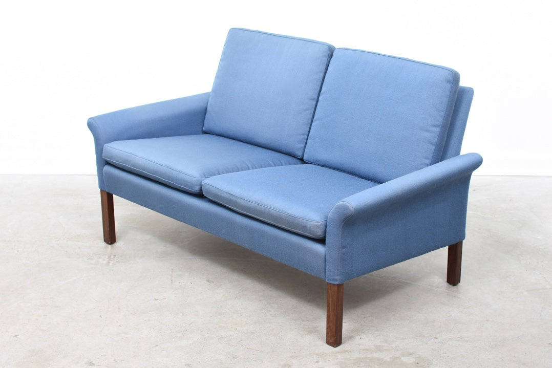 Baby blue two seater on rosewood legs