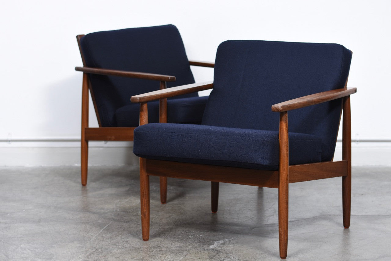 Two available: Teak lounge chairs with felt wool cushions