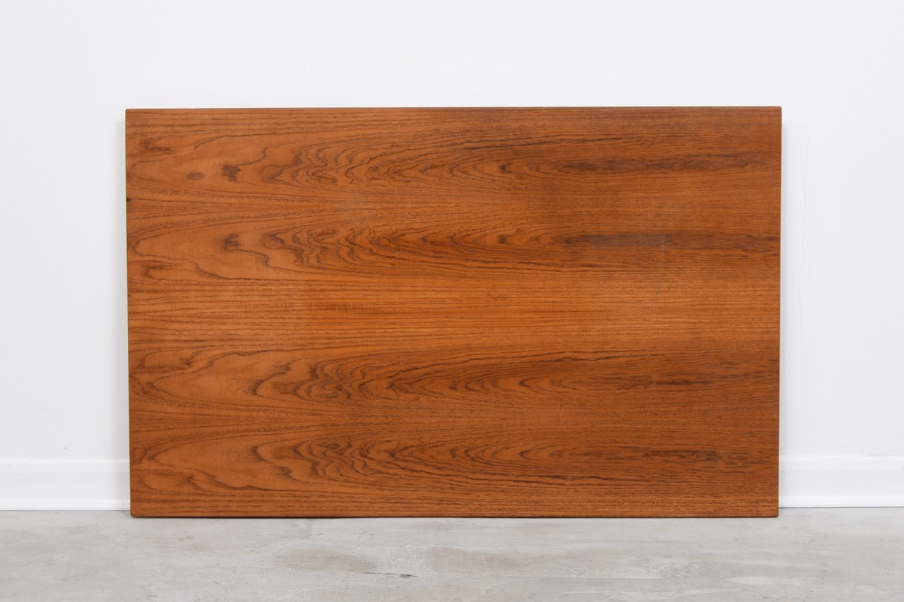 Rectangular dining table with hidden leaves