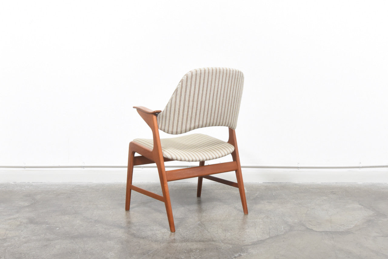 Two available: Teak-framed armchair
