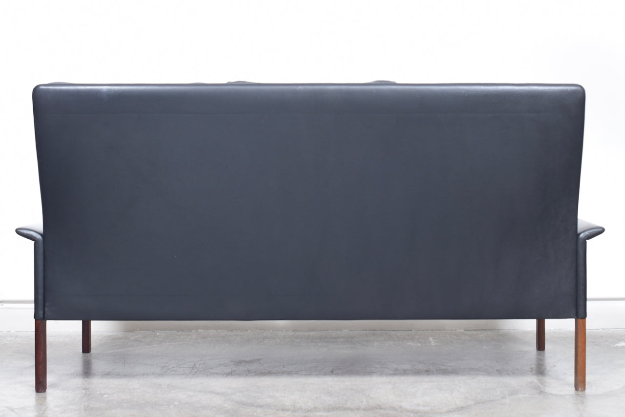 High back three seat leather sofa by Hans Olsen