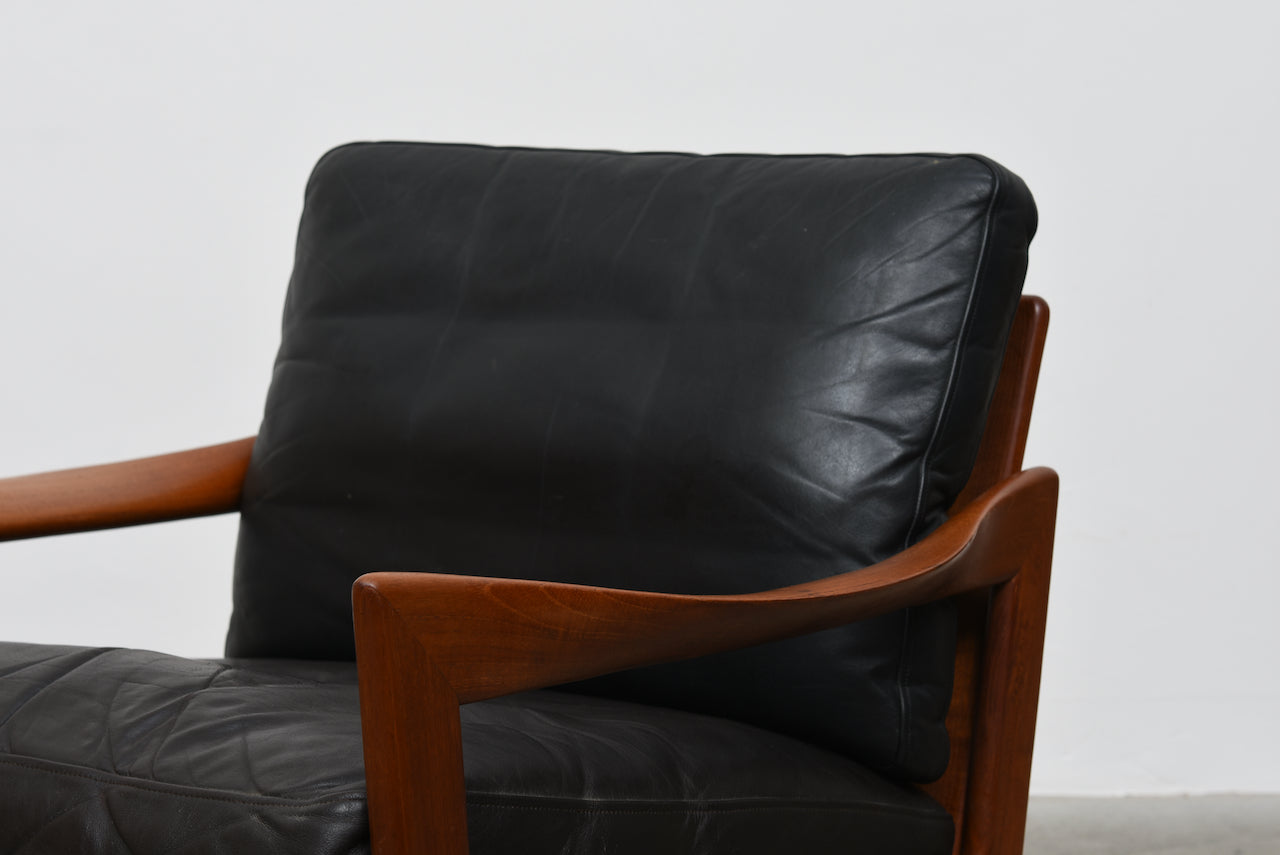 Teak + leather lounger by Illum Wikkelsø