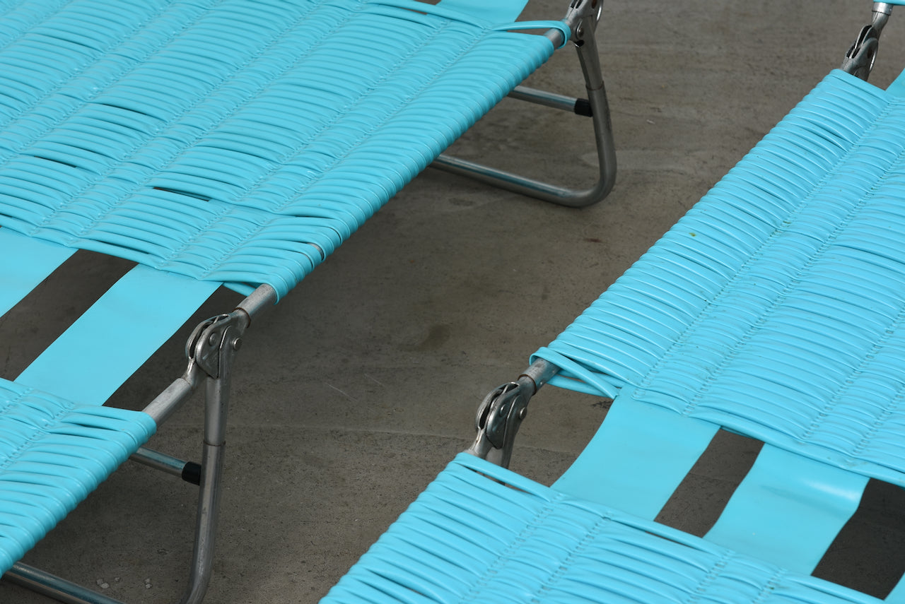 Two available: 1970s vinyl + metal sun beds