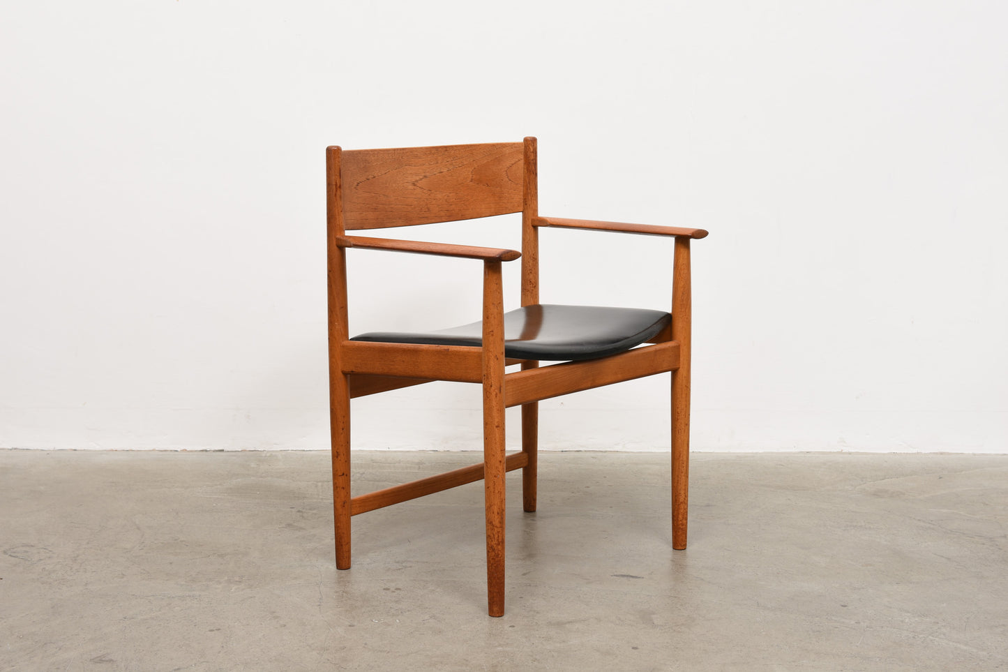 1960s teak + vinyl armchair