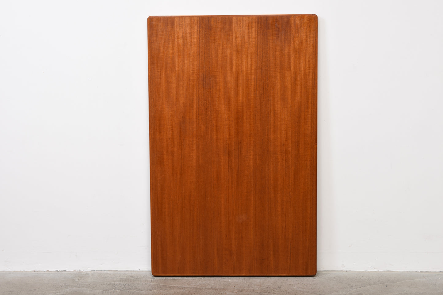 Extending teak dining table by Henning Kjærnulf