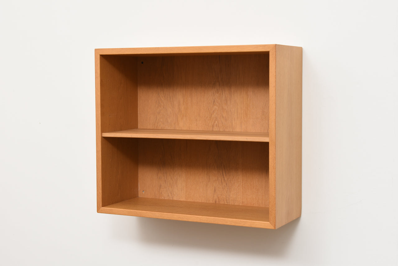 Oak wall cheap mounted bookcase