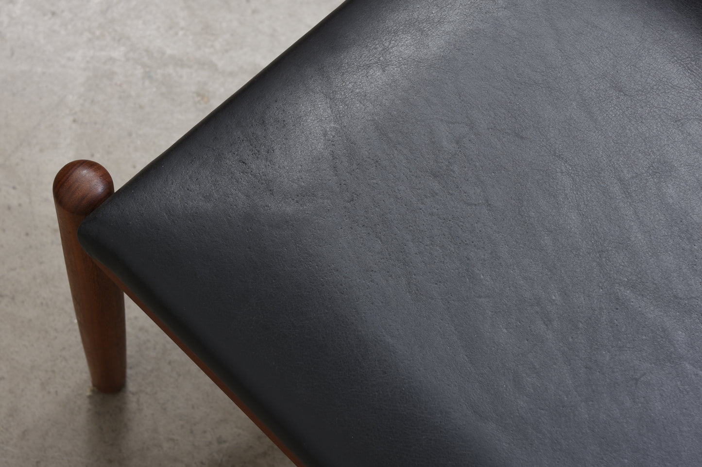 Teak + leather foot stool by Spotterup