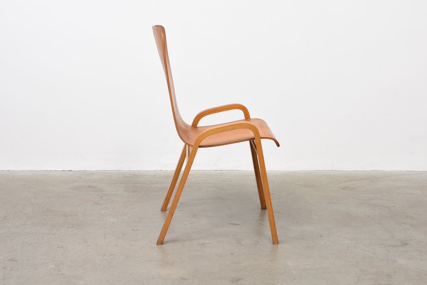 Set of four teak + beech stacking chairs