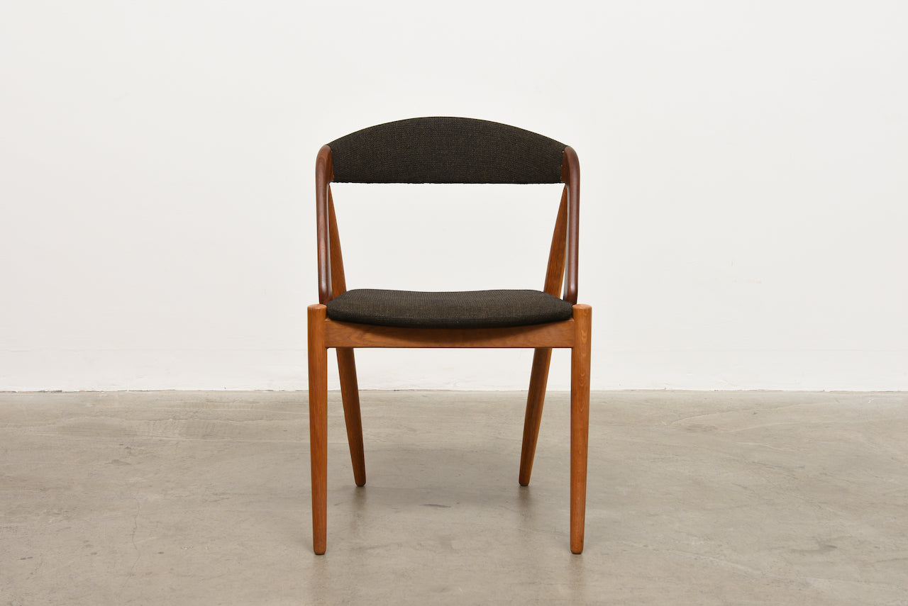 Includes new upholstery: 1960s teak + oak chairs by Kai Kristiansen