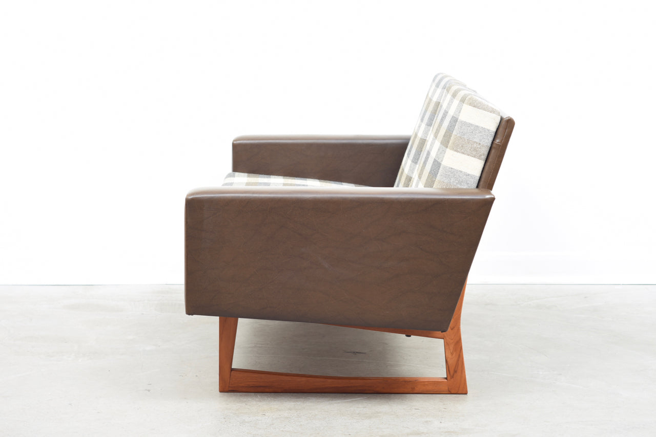 Two seat sofa on teak sleigh legs