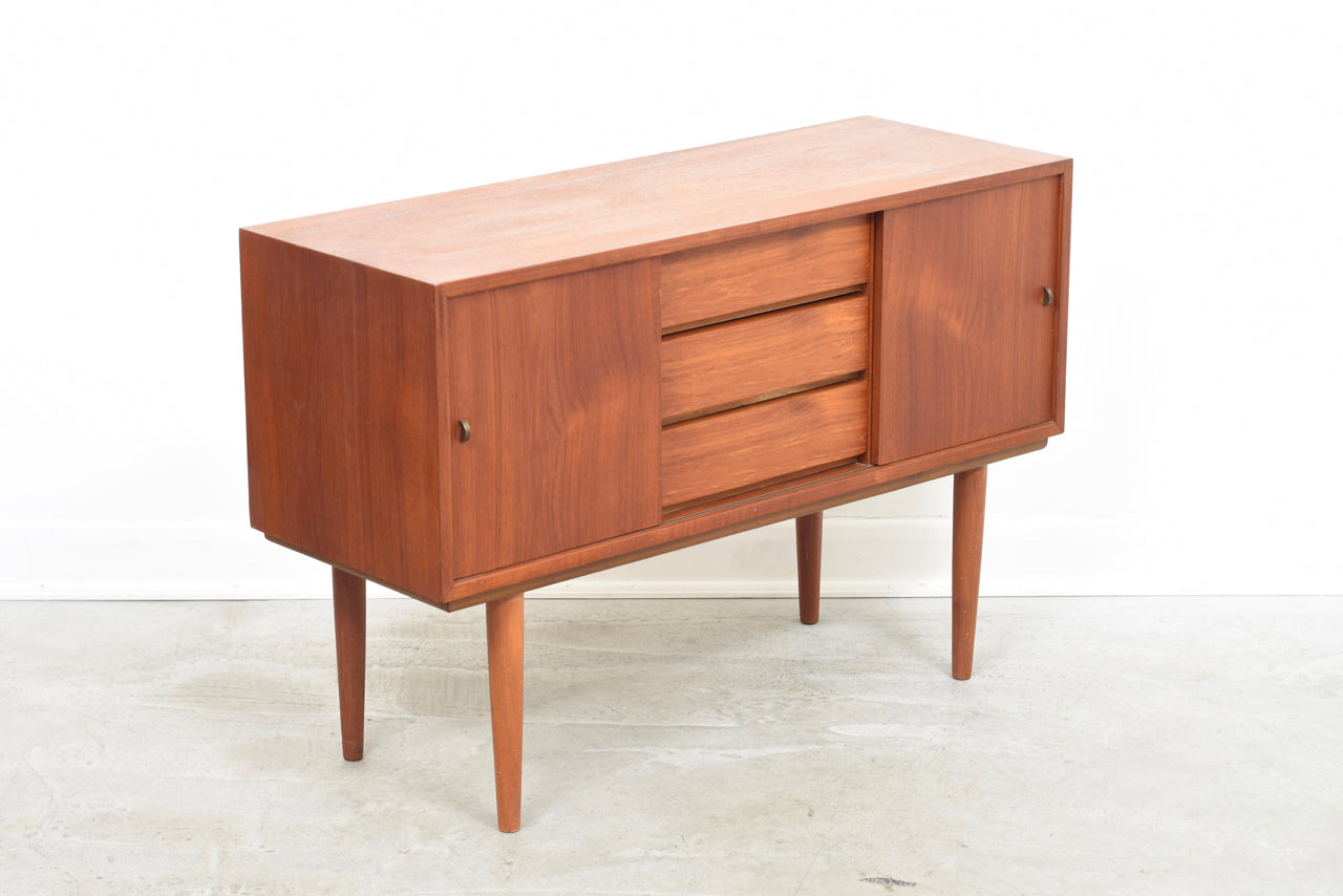 Short teak storage cabinet