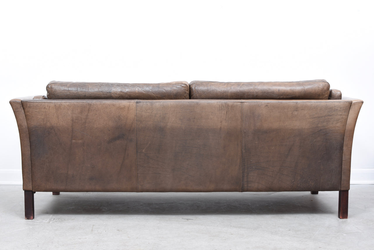 Two and a half seat leather sofa by Mogens Hansen
