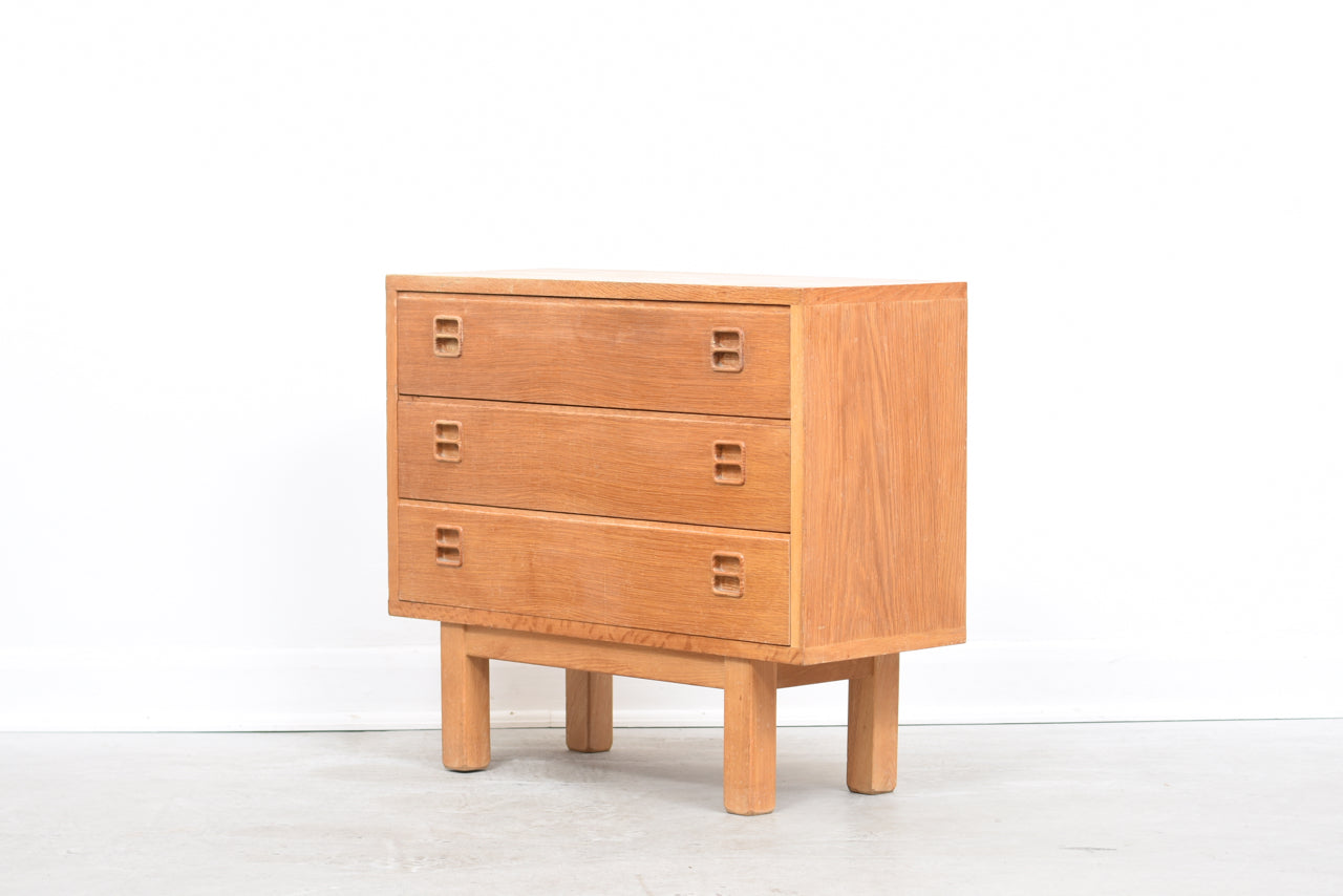 Low oak chest of drawers