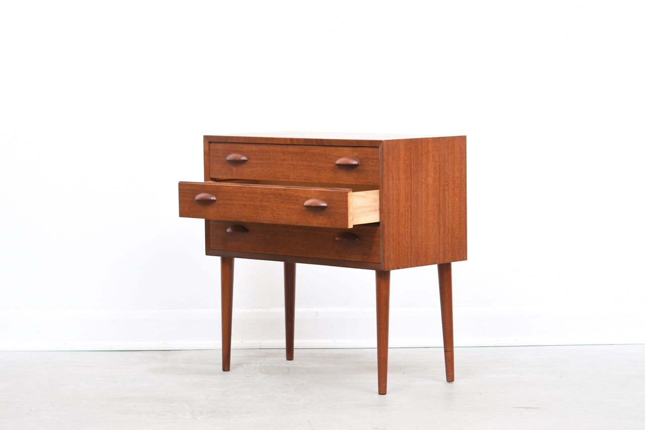 Low teak chest of drawers