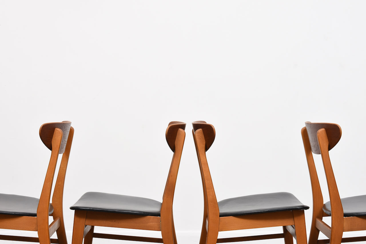 Set of four teak + beech dining chairs by Farstrup