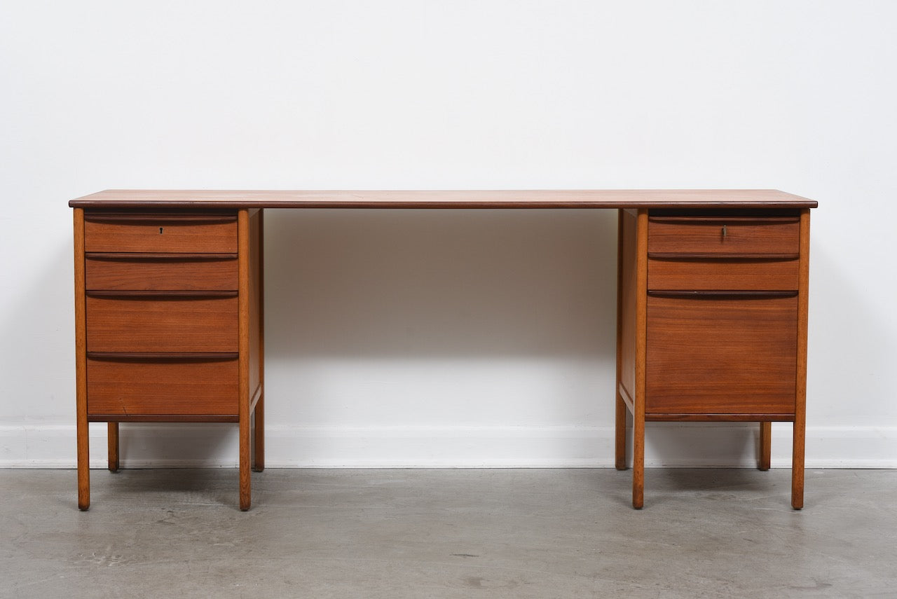 1960s twin pedestal desk in teak + oak