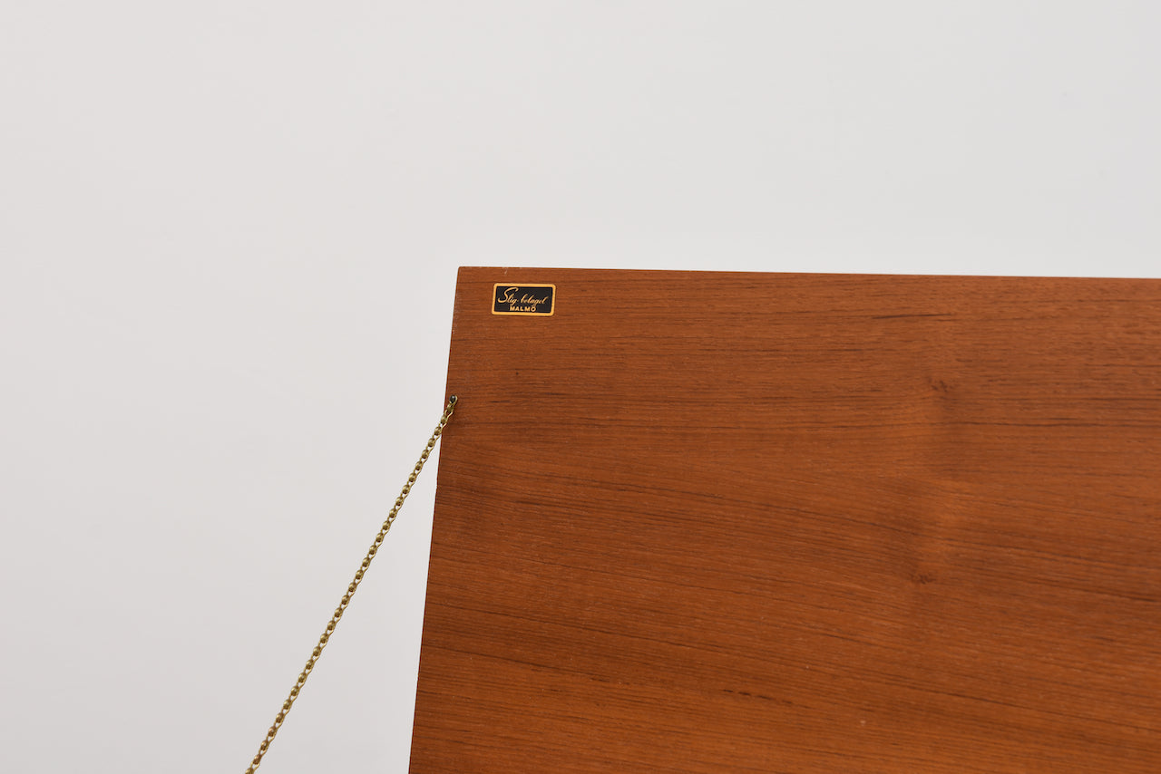 Low teak cabinet by Stig Bolaget