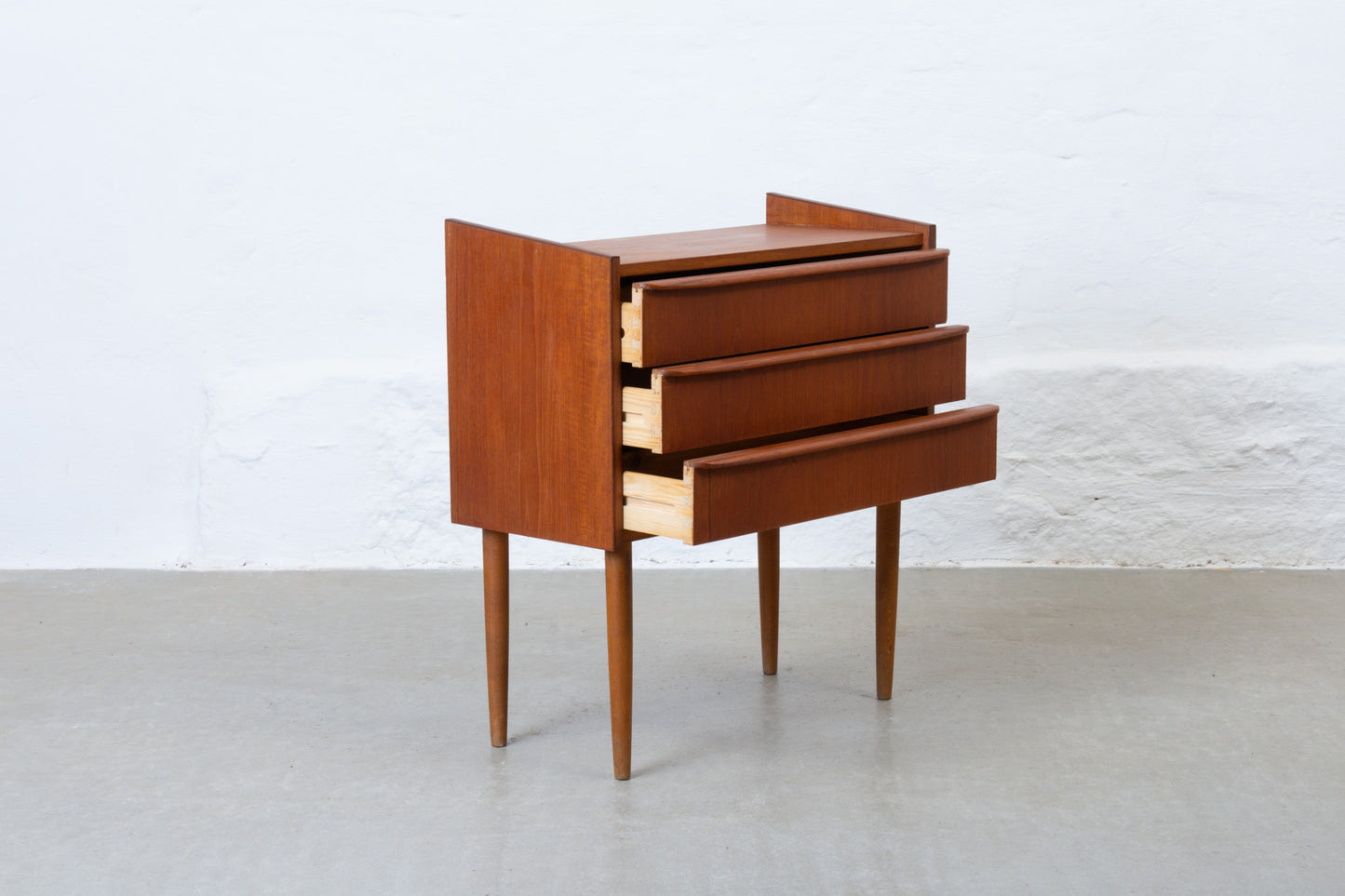 1960s low chest of three drawers in teak