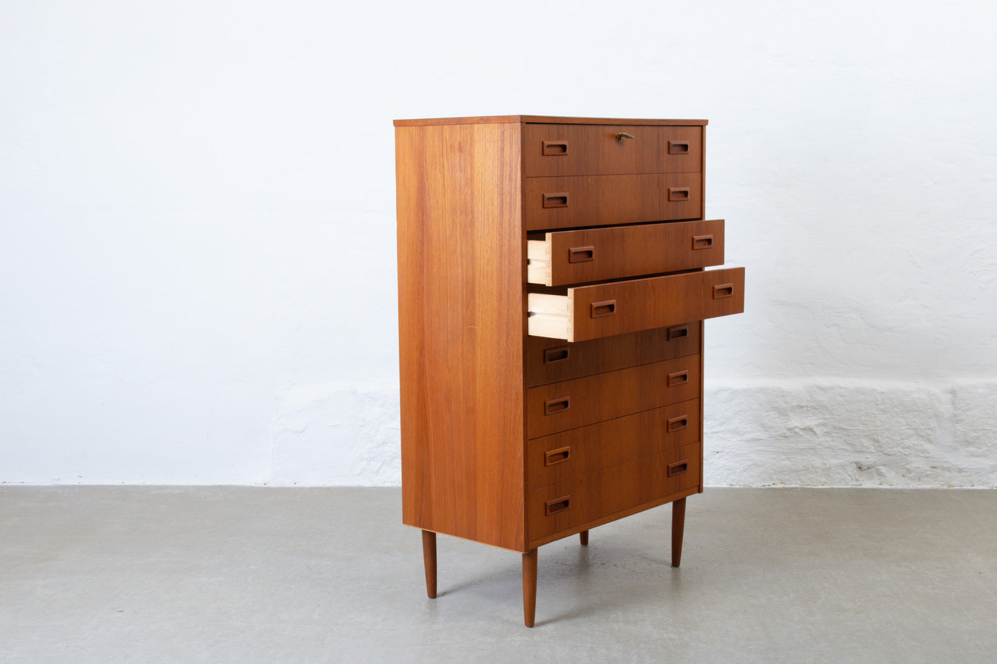 1960s teak chest of eight drawers
