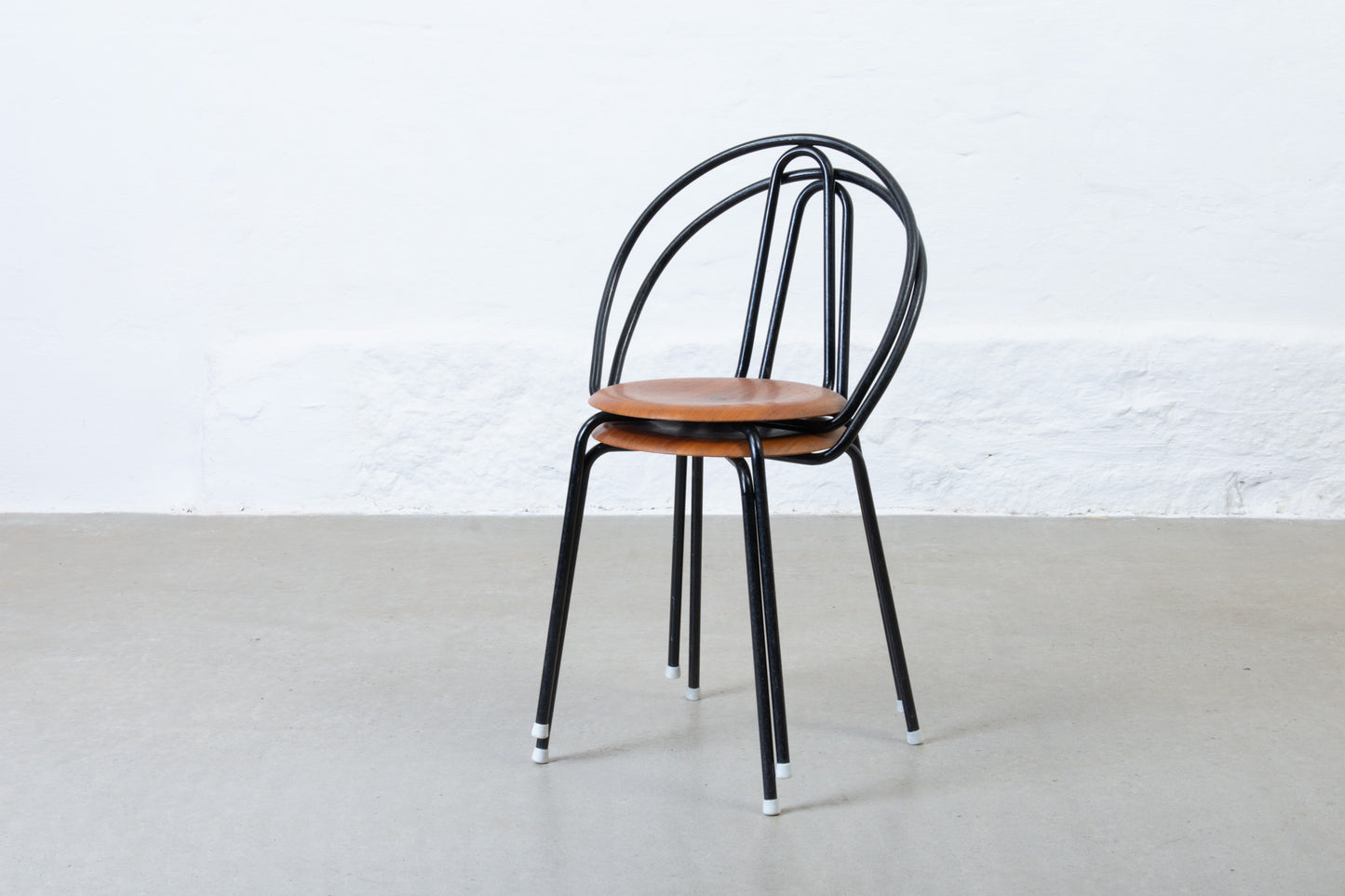 Two available: 1950s stacking chairs in metal + teak
