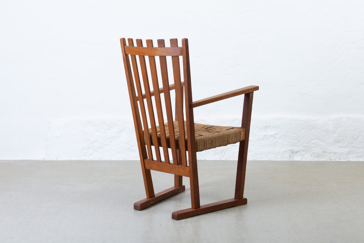 Early 1900s oak + cord armchair