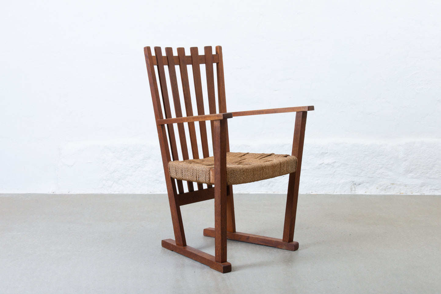Early 1900s oak + cord armchair