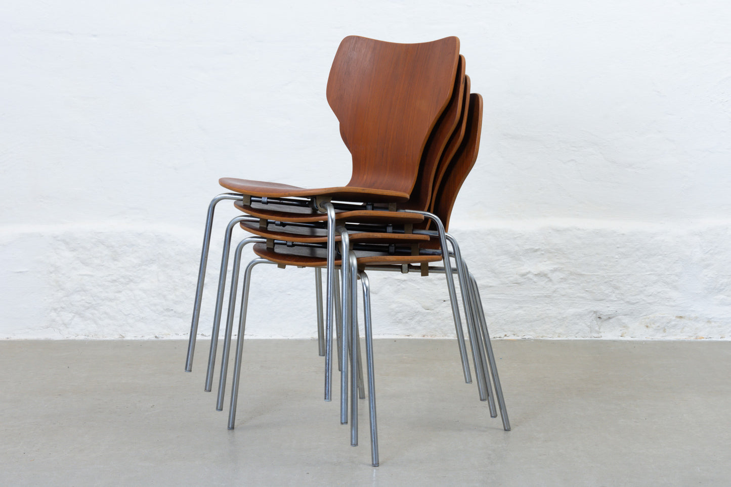 Set of four 1960s stacking chairs in teak