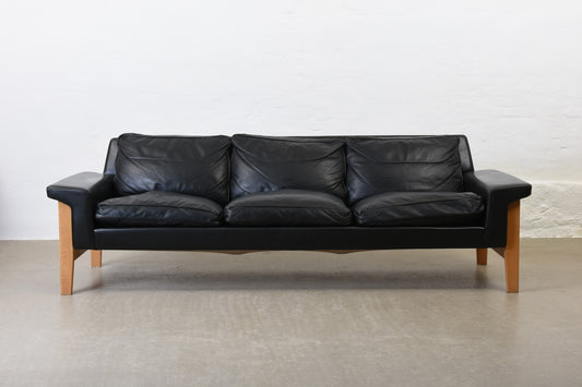 1960s leather + oak three seater by Ulferts