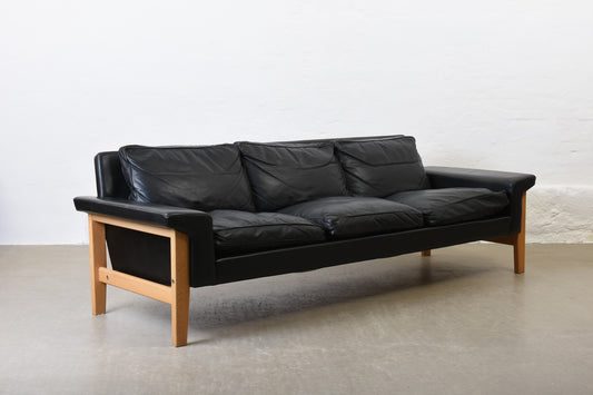 1960s leather + oak three seater by Ulferts