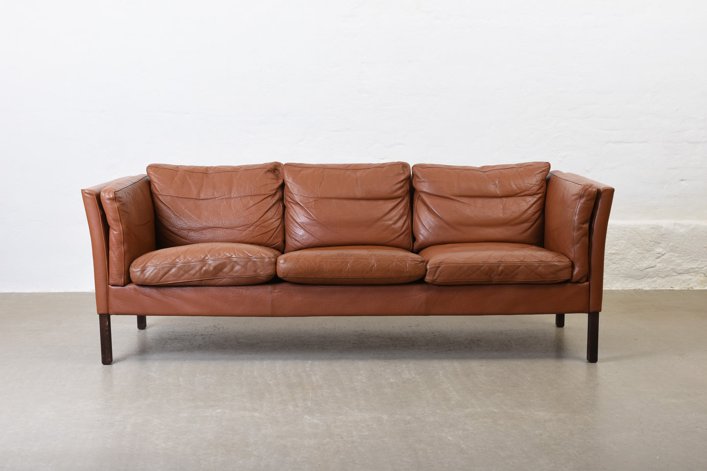 Vintage Danish three seater in cognac leather