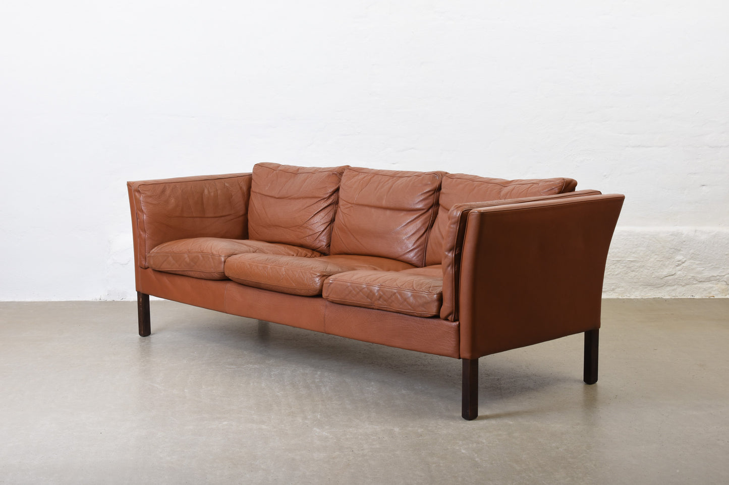 Vintage Danish three seater in cognac leather