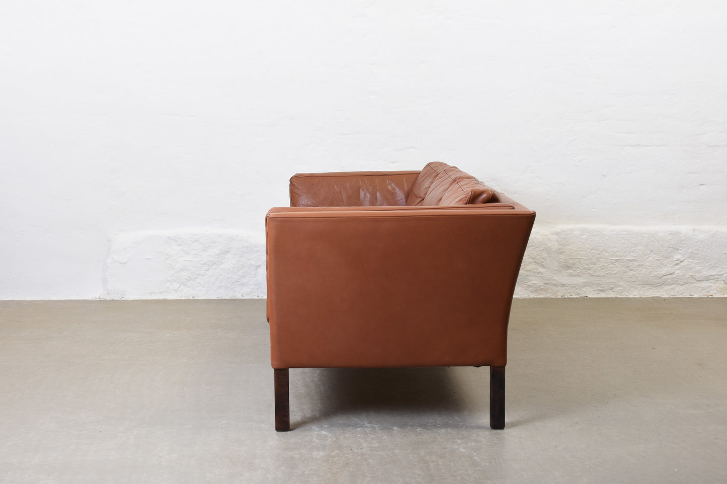 Vintage Danish three seater in cognac leather