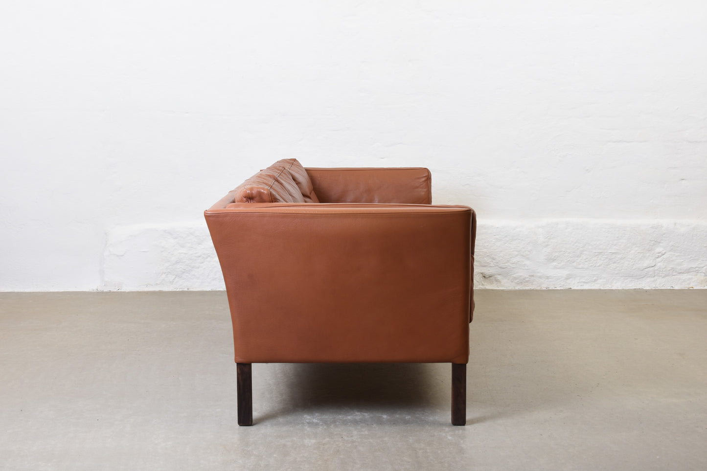 Vintage Danish three seater in cognac leather