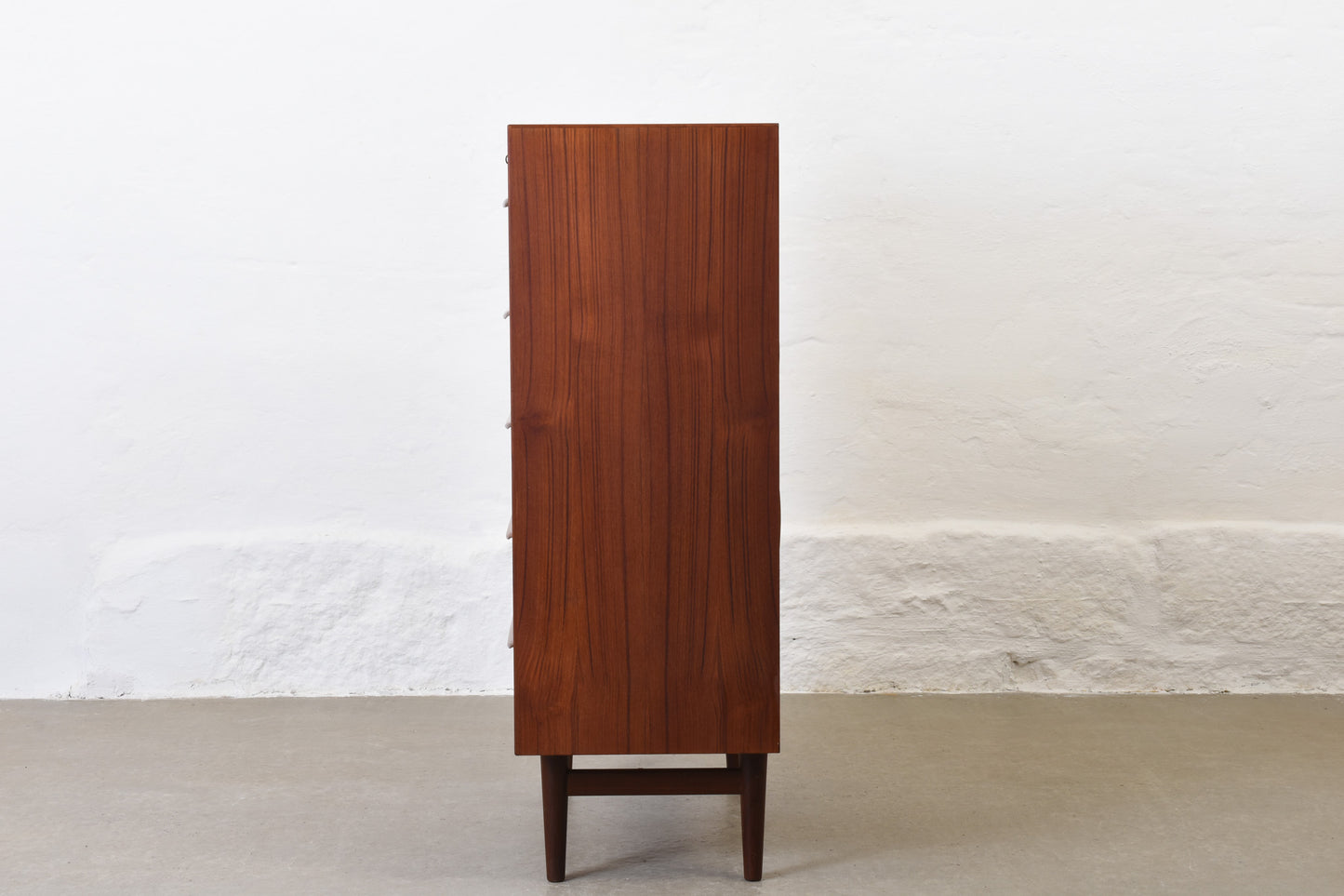 1960s teak chest of seven drawers with lipped handles