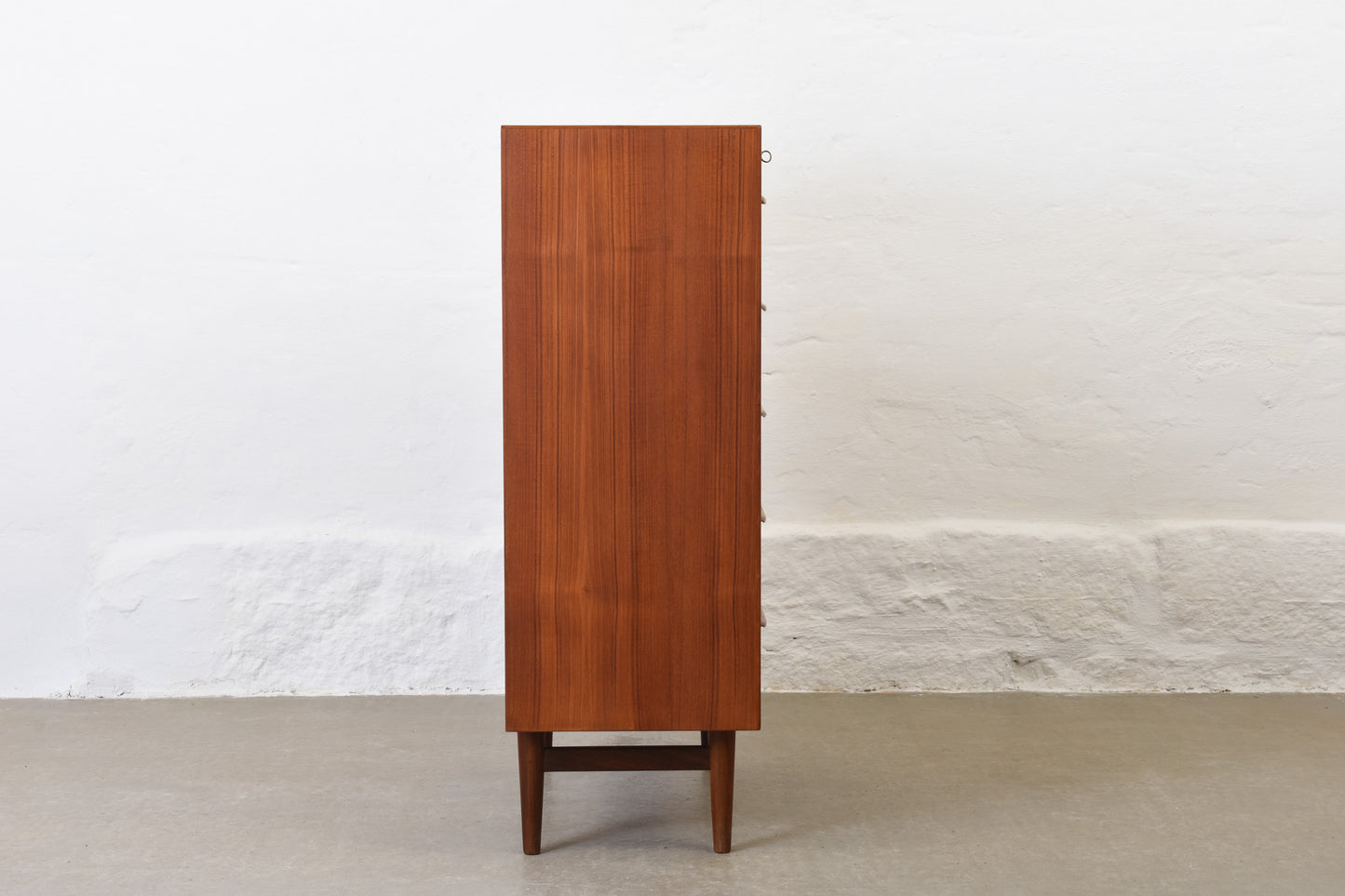 1960s teak chest of seven drawers with lipped handles