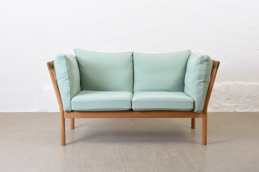 Newly reupholstered: 1980s oak two seater by Finn Østergaard