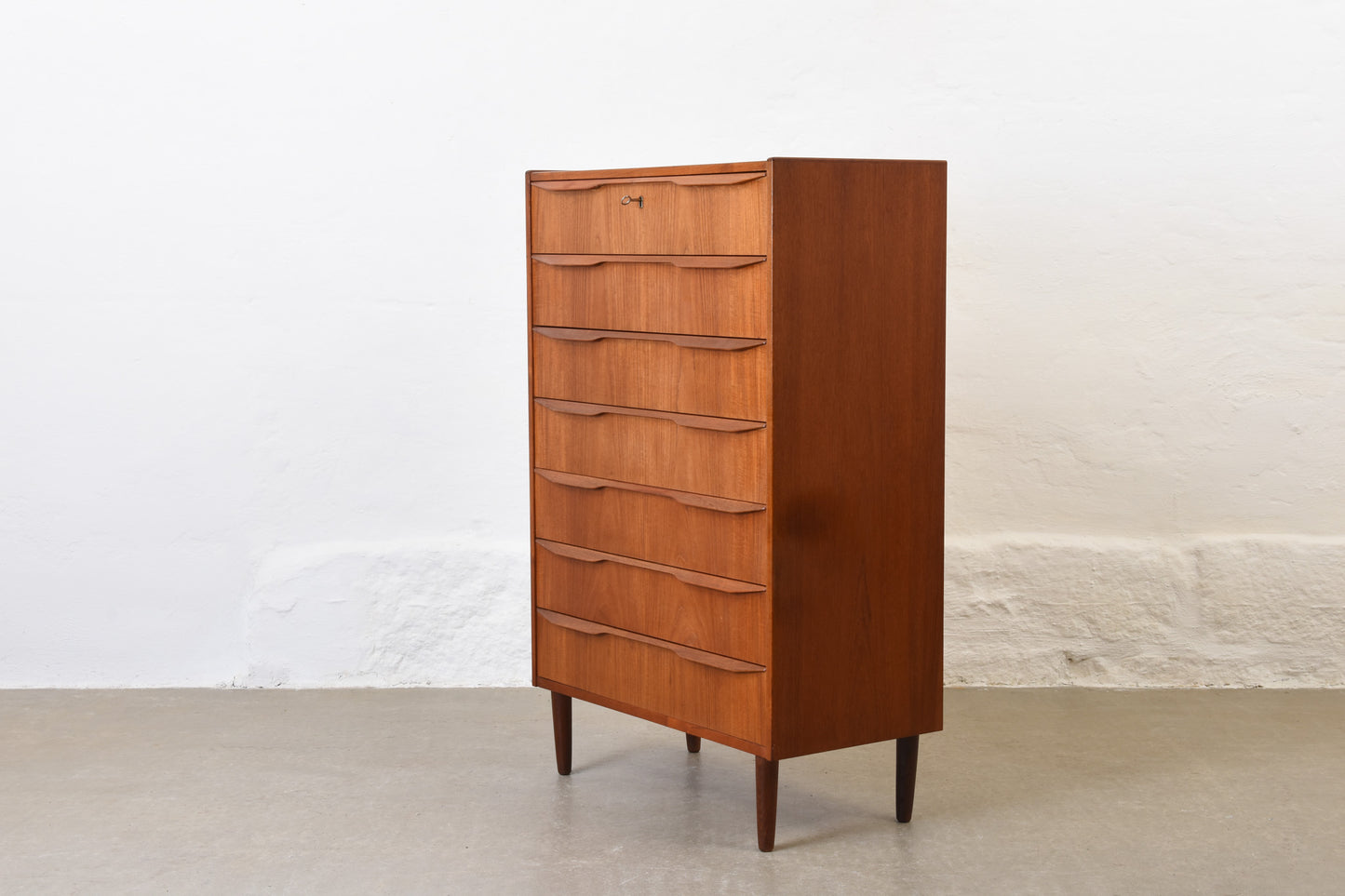 1960s teak chest of seven drawers