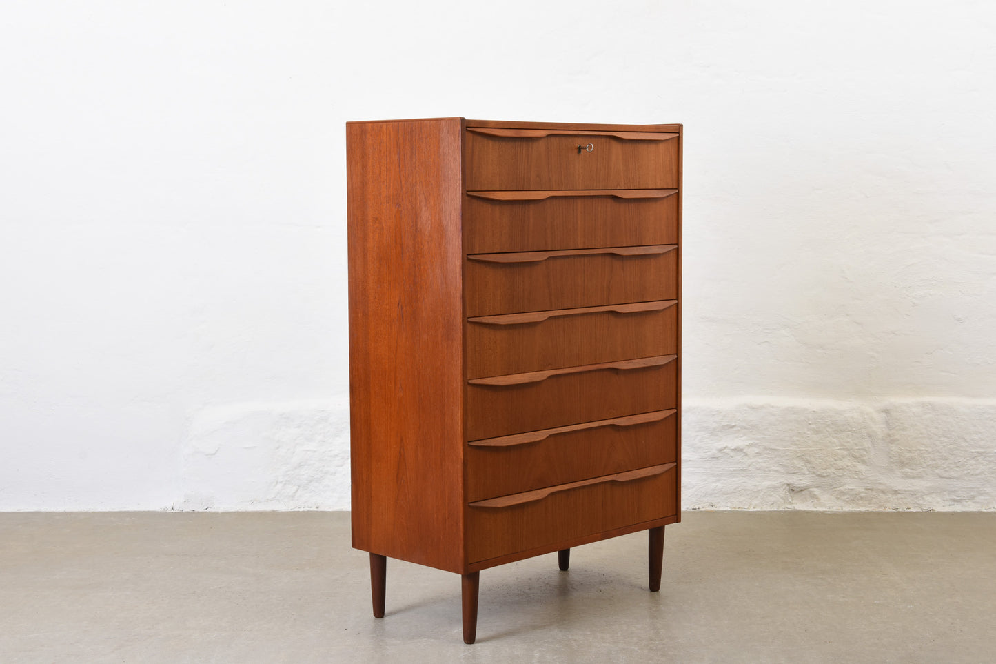 1960s teak chest of seven drawers