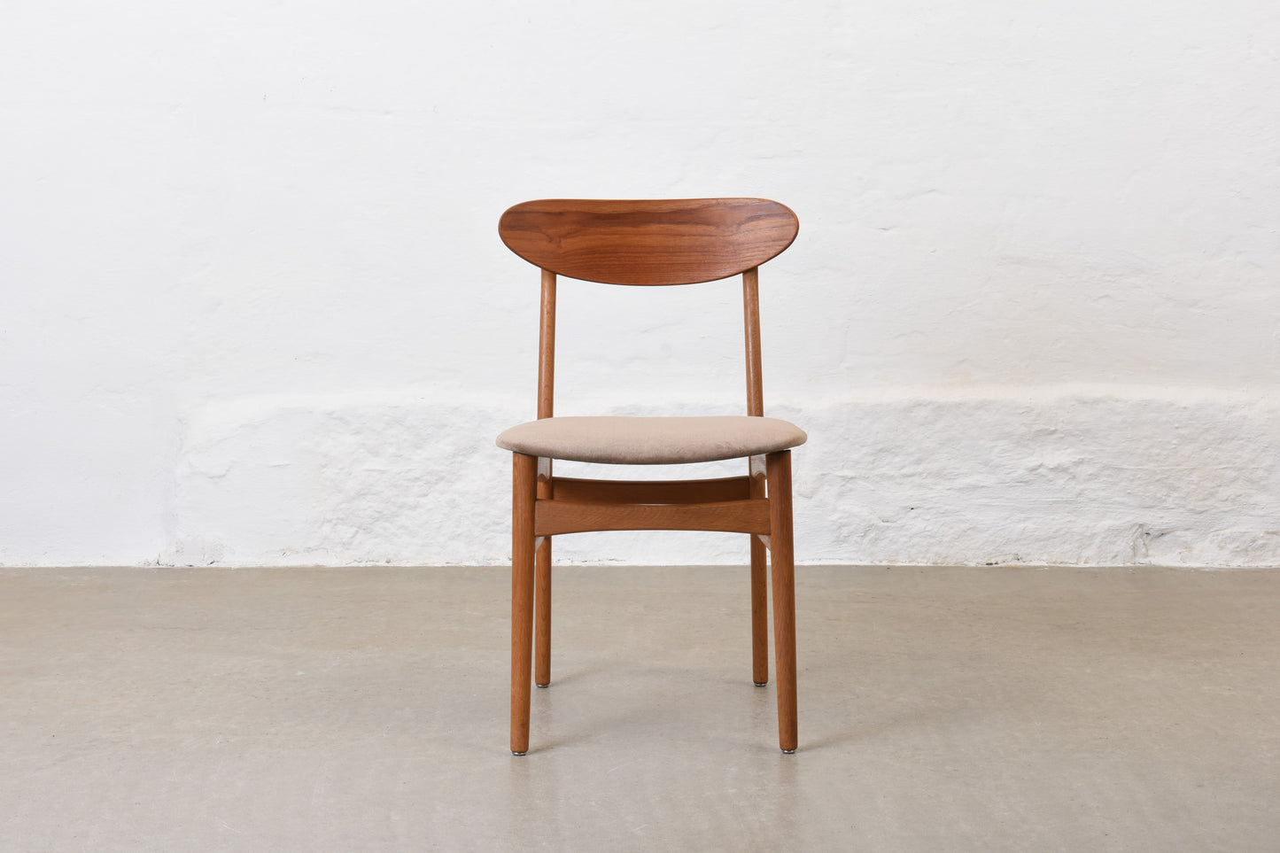 Newly reupholstered: 1960s set of four teak + oak dining chairs