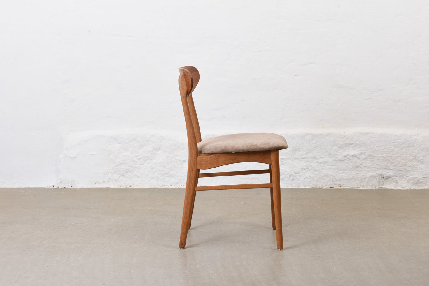 Newly reupholstered: 1960s set of four teak + oak dining chairs