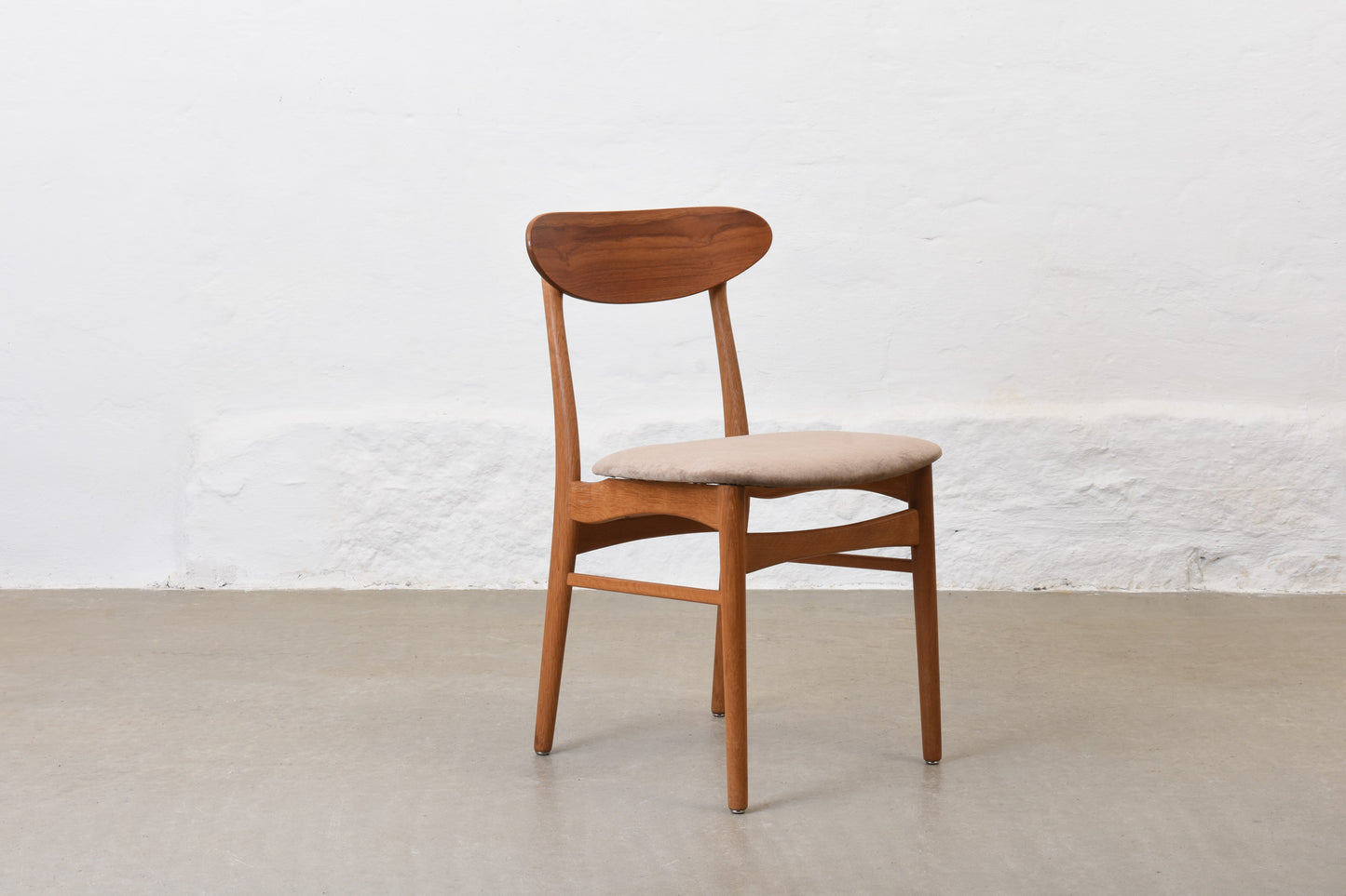 Newly reupholstered: 1960s set of four teak + oak dining chairs