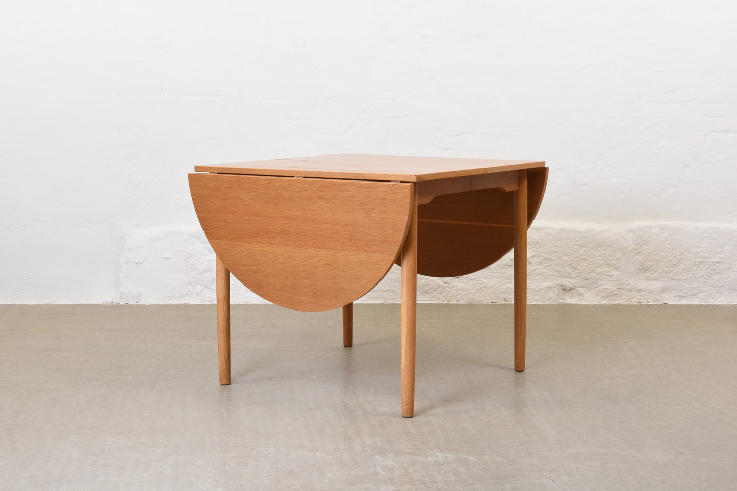 1960s extending drop-leaf dining table in oak