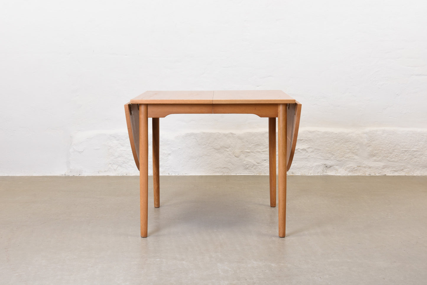 1960s extending drop-leaf dining table in oak