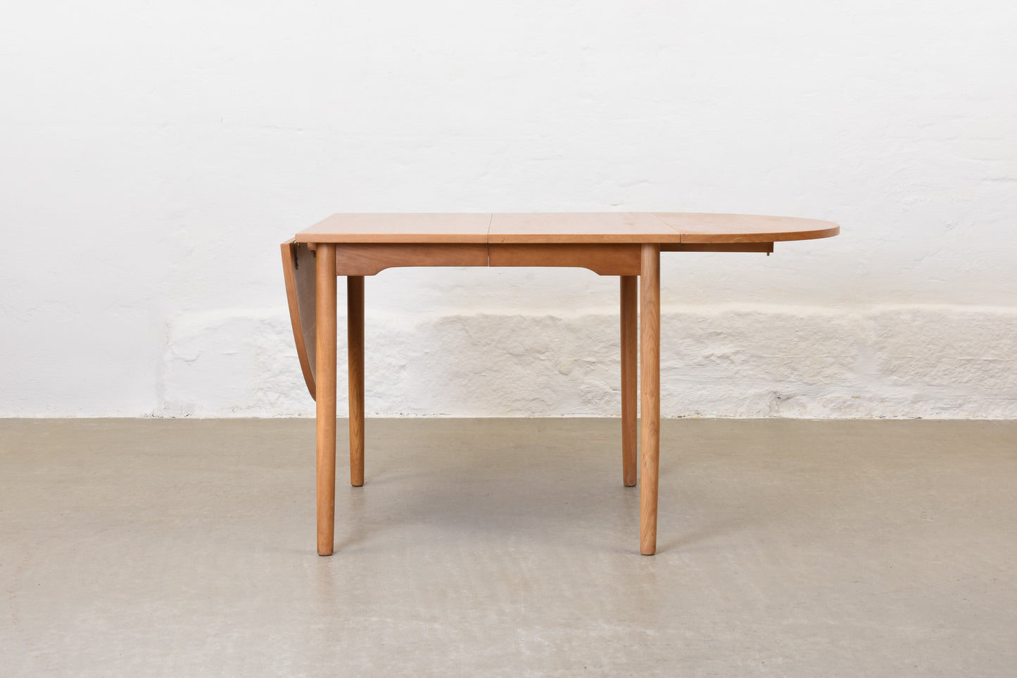 1960s extending drop-leaf dining table in oak