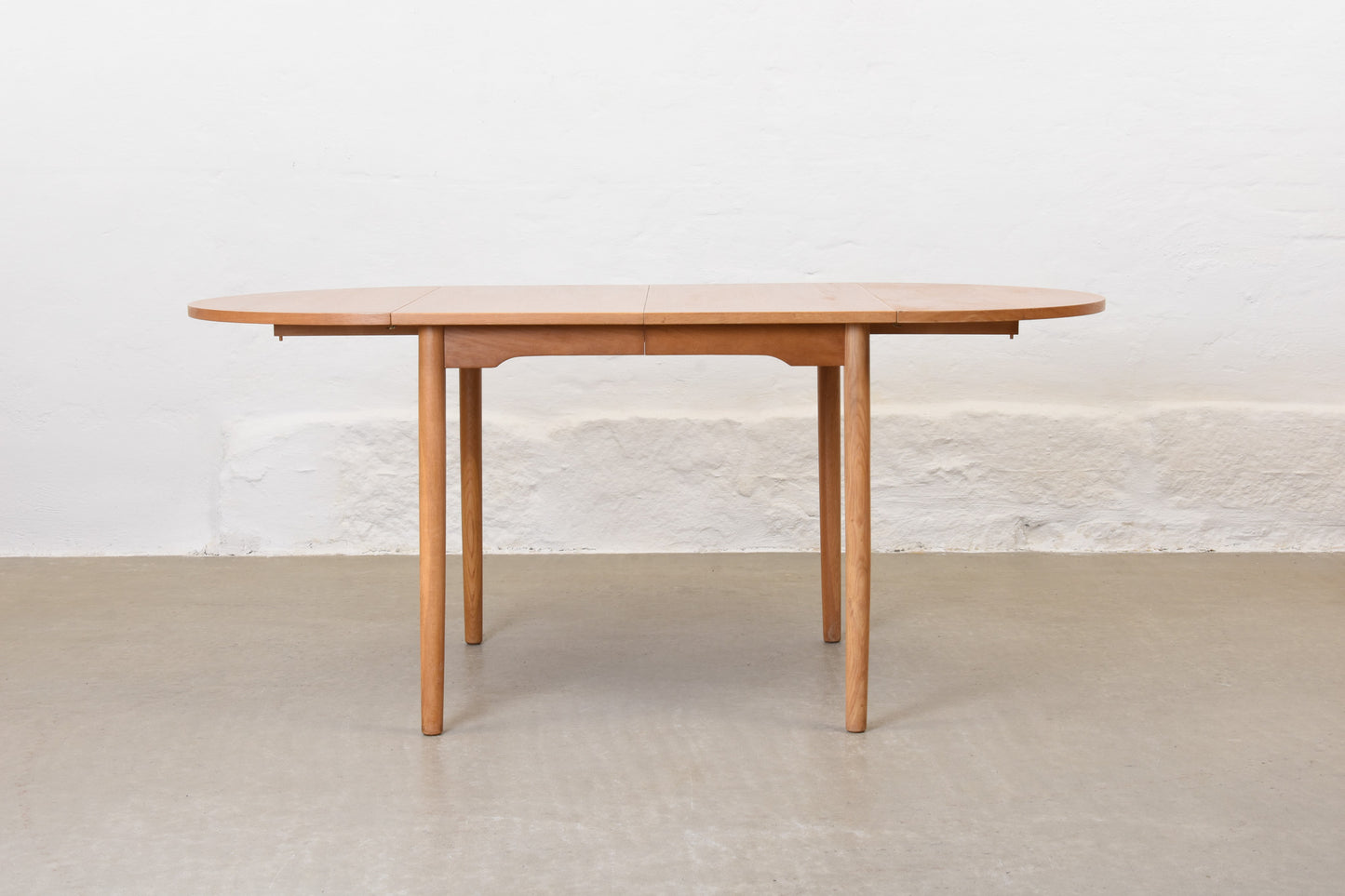 1960s extending drop-leaf dining table in oak