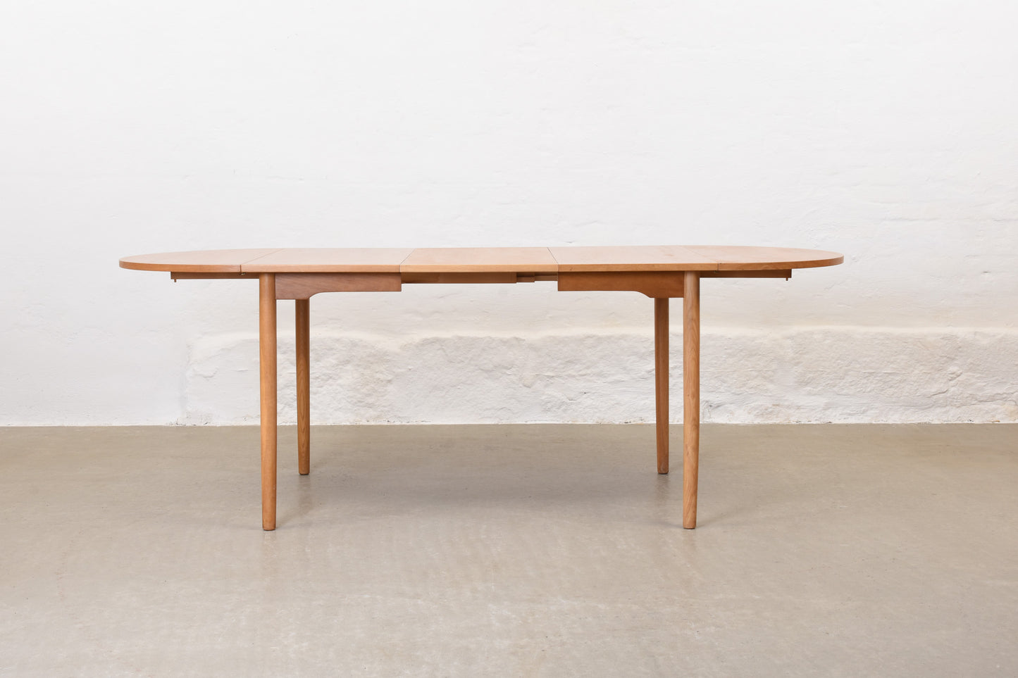 1960s extending drop-leaf dining table in oak